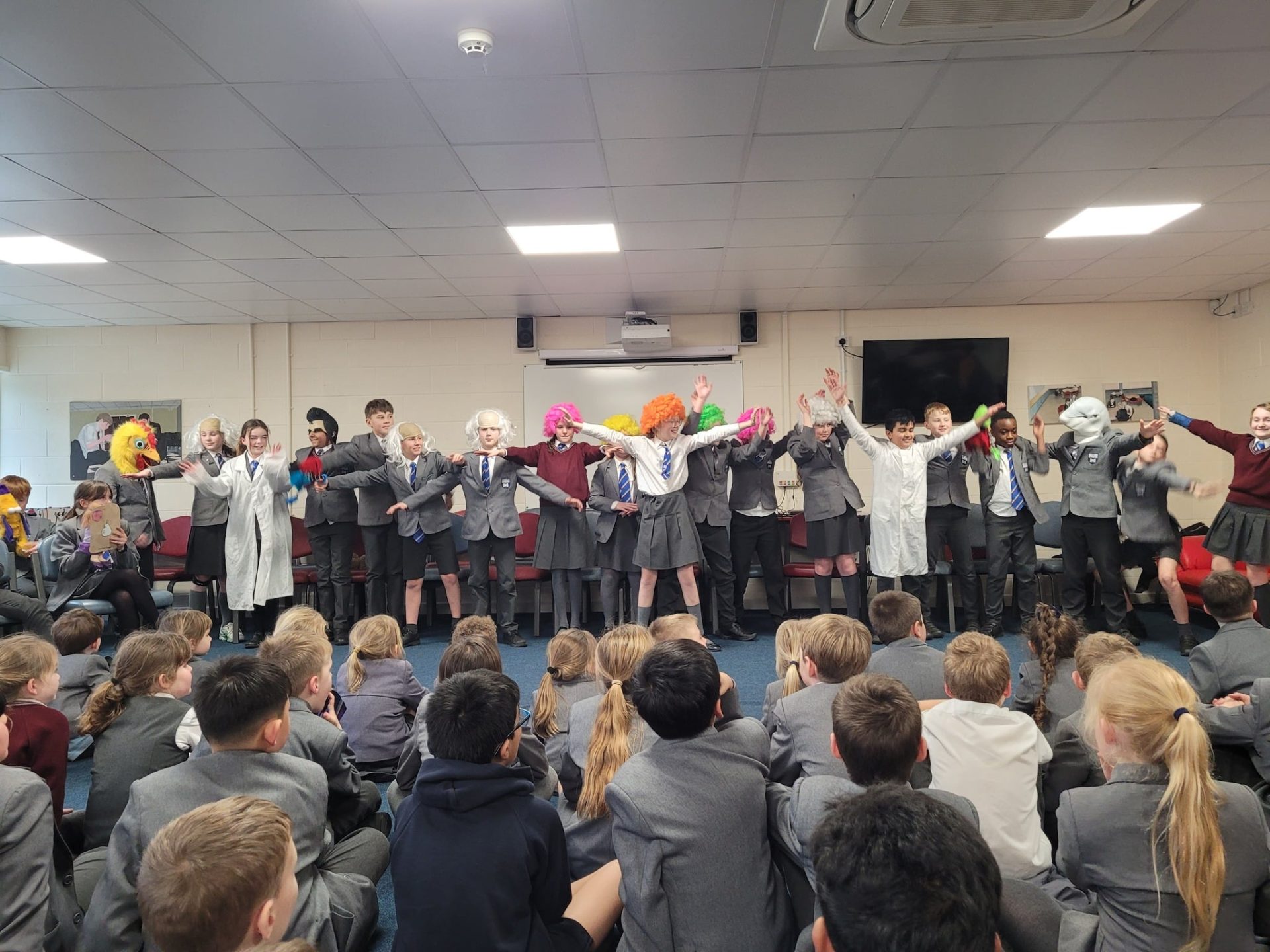 Pupils performing the E-Safety Game Show in front of a school audience